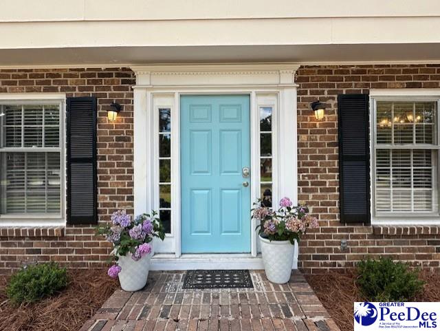 1328 Salem Rd, Hartsville, SC 29550 - property entrance with brick siding