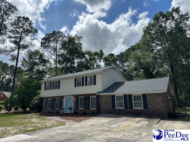 1328 Salem Rd, Hartsville, SC 29550 - view of front of property featuring concrete driveway and brick siding