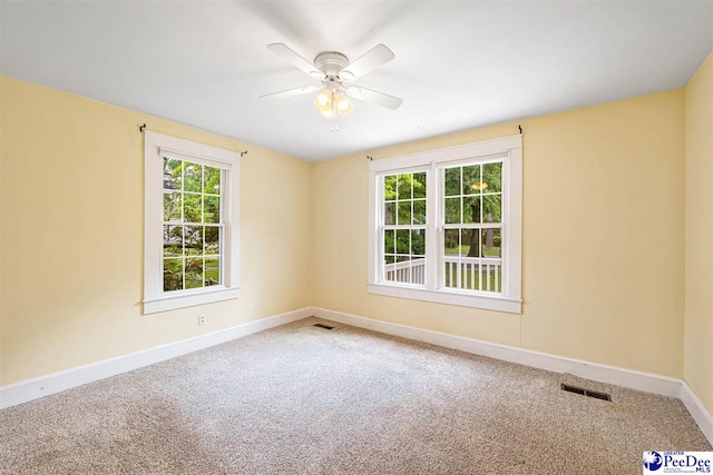 1461 King Ave, Florence, SC 29501 - spare room with carpet floors and a ceiling fan