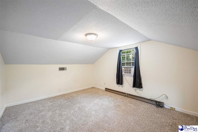 1461 King Ave, Florence, SC 29501 - bonus room featuring carpet flooring, lofted ceiling, a textured ceiling, and a baseboard radiator