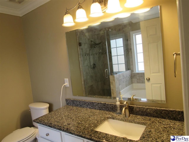 full bath featuring toilet, a garden tub, ornamental molding, a stall shower, and vanity