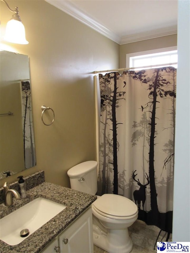 full bathroom with curtained shower, vanity, toilet, and crown molding