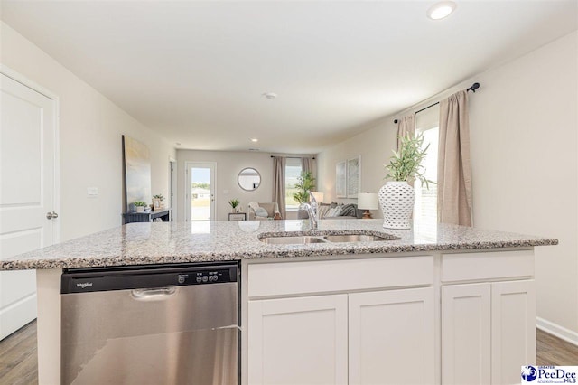 563 Strawberry Field Way, Galivants Ferry, SC 29544 - kitchen with stainless steel dishwasher, open floor plan, white cabinets, wood finished floors, and light stone counters