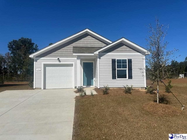 563 Strawberry Field Way, Galivants Ferry, SC 29544 - ranch-style home featuring concrete driveway and a garage
