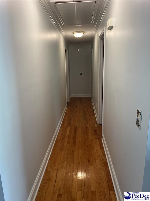 1840 New Zion Rd, Lake City, SC 29560 - corridor with attic access, wood finished floors, and ornamental molding