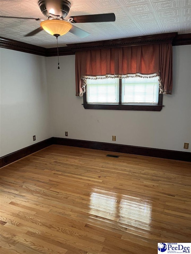 1840 New Zion Rd, Lake City, SC 29560 - empty room with ceiling fan and wood finished floors