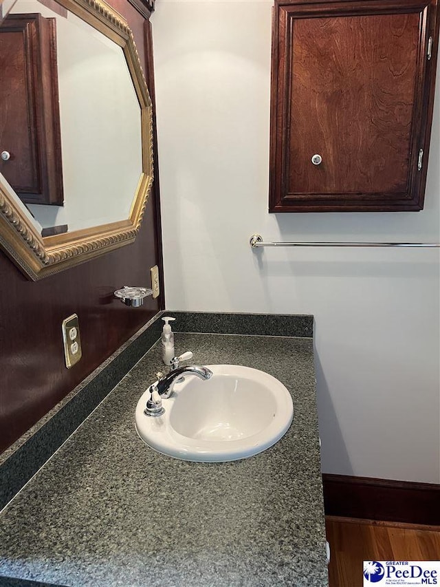 1840 New Zion Rd, Lake City, SC 29560 - bathroom featuring vanity and wood finished floors