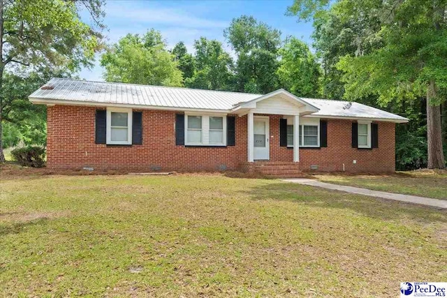 434 Heidi Dr, Pamplico, SC 29583 - ranch-style house with crawl space, a front lawn, and metal roof