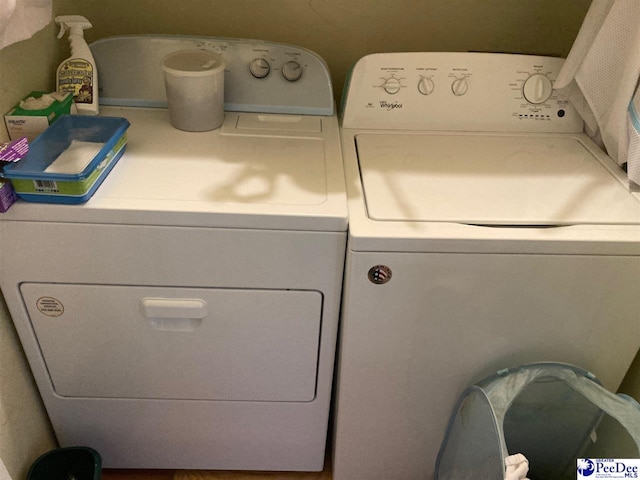 laundry area featuring washer and clothes dryer