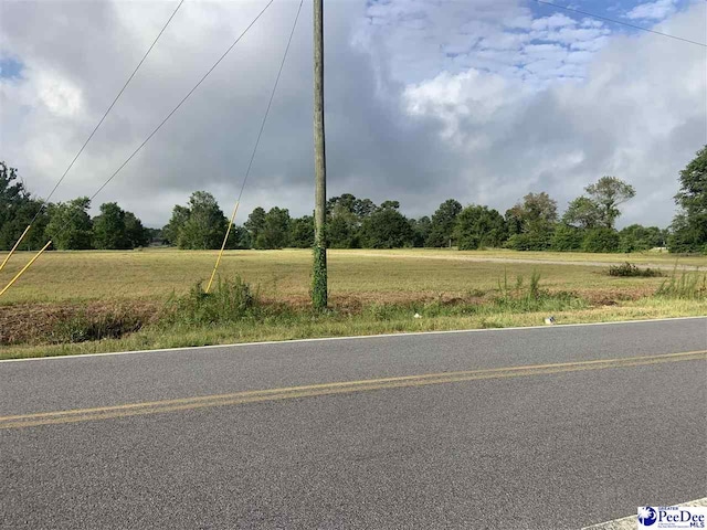 view of road featuring a rural view