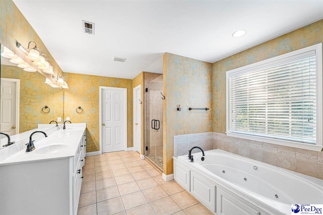 3326 Tennyson Dr, Florence, SC 29501 - bathroom with double vanity, a whirlpool tub, tile patterned floors, and a stall shower