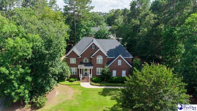3326 Tennyson Dr, Florence, SC 29501 - view of front of house featuring a front lawn