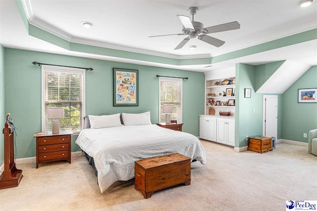 3326 Tennyson Dr, Florence, SC 29501 - bedroom with crown molding, a tray ceiling, multiple windows, and light carpet