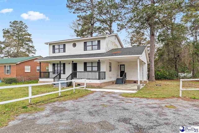 548 Mciver Rd, Florence, SC 29506 - view of front of property featuring driveway, covered porch, a front yard, and a carport