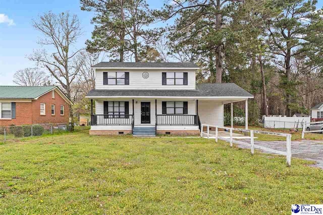 548 Mciver Rd, Florence, SC 29506 - view of front facade featuring fence, crawl space, a front yard, covered porch, and a carport
