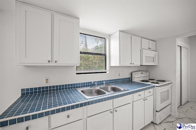 548 Mciver Rd, Florence, SC 29506 - kitchen with white cabinets, tile counters, white appliances, marble finish floor, and a sink