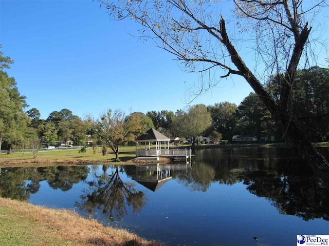 property view of water with a gazebo