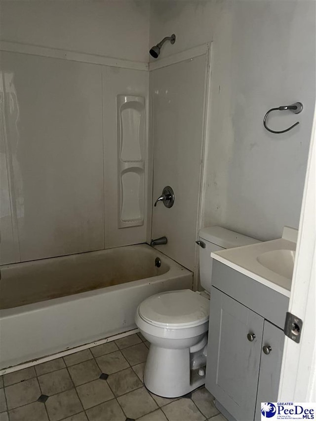 full bathroom featuring vanity, shower / washtub combination, and toilet