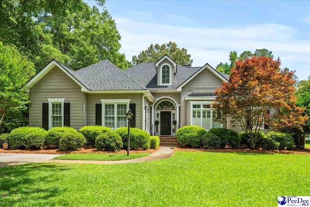 130 Nez Perce Dr, Darlington, SC 29532 - view of front of property featuring a front yard and roof with shingles