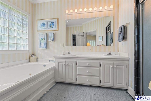 130 Nez Perce Dr, Darlington, SC 29532 - full bathroom featuring wallpapered walls, a jetted tub, double vanity, and crown molding