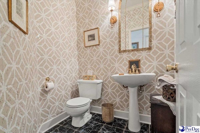 130 Nez Perce Dr, Darlington, SC 29532 - half bath featuring wallpapered walls and marble look tiles