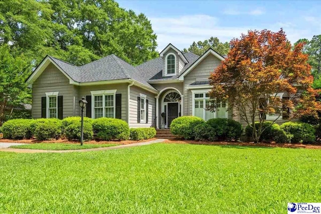 130 Nez Perce Dr, Darlington, SC 29532 - view of front of home featuring a front yard and roof with shingles