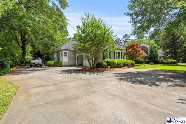 130 Nez Perce Dr, Darlington, SC 29532 - view of property hidden behind natural elements with driveway and a front yard