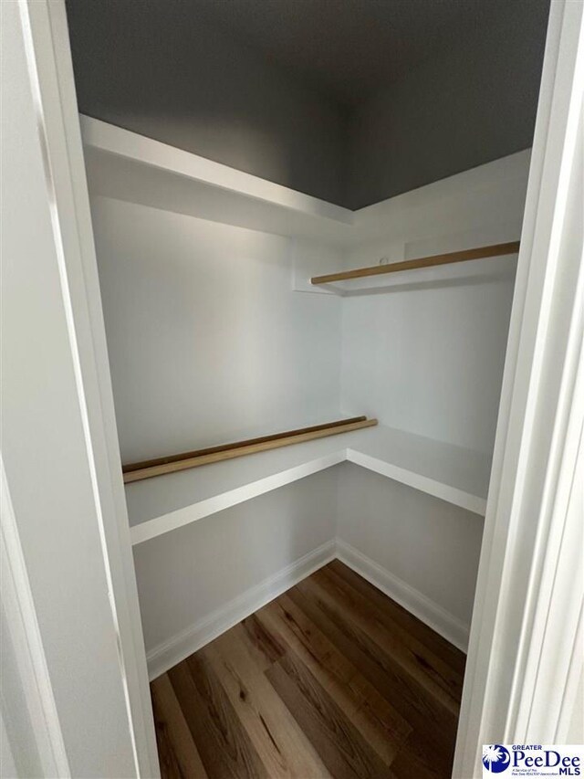 7845 E National Cemetery Rd, Florence, SC 29506 - spacious closet with wood finished floors