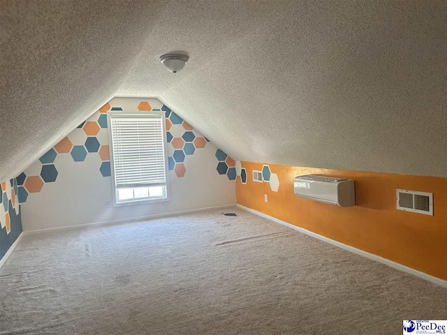 2143 Glenmore Way, Florence, SC 29505 - bonus room with a textured ceiling, carpet floors, a wall mounted air conditioner, and vaulted ceiling