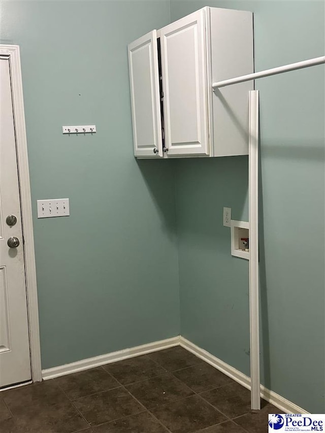 2143 Glenmore Way, Florence, SC 29505 - laundry room with cabinet space, washer hookup, and dark tile patterned flooring