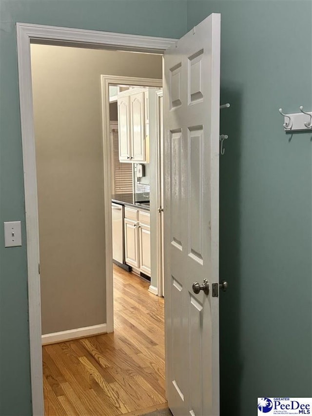 2143 Glenmore Way, Florence, SC 29505 - corridor with light wood-style floors and baseboards
