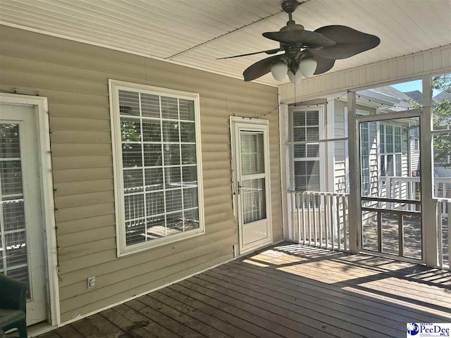 2143 Glenmore Way, Florence, SC 29505 - unfurnished sunroom with a ceiling fan