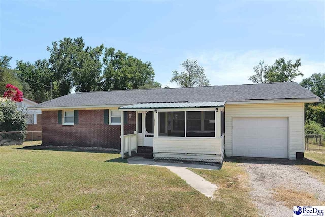 ranch-style home with a front lawn and a garage