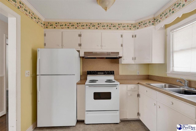 kitchen featuring sink, white appliances, white cabinetry, and light tile patterned floors