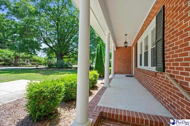 view of patio featuring a porch