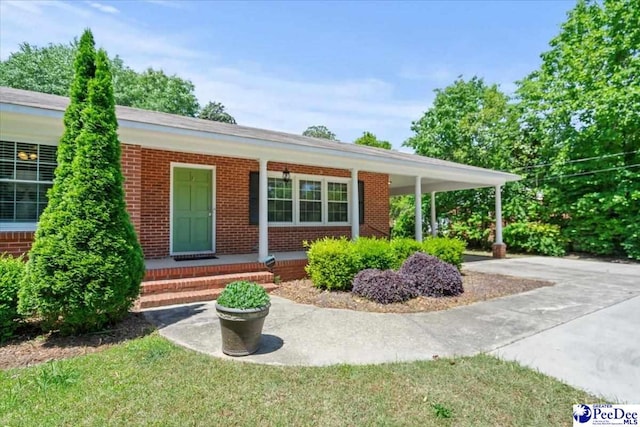 view of front of house with brick siding