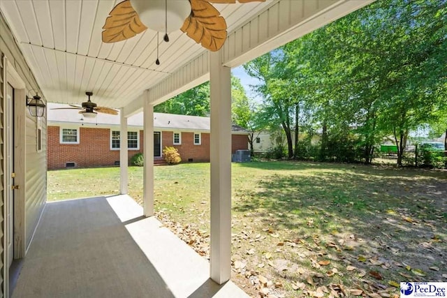 view of patio with central AC and a ceiling fan