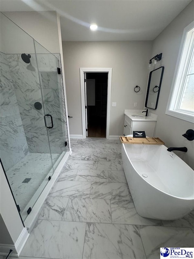 full bathroom featuring recessed lighting, vanity, marble finish floor, a soaking tub, and a marble finish shower