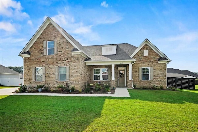 craftsman inspired home with a front yard