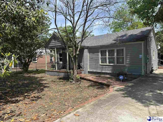 17 Shuler Dr, Sumter, SC 29150 - view of front of property featuring covered porch and roof with shingles