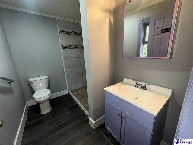 17 Shuler Dr, Sumter, SC 29150 - bathroom featuring vanity, crown molding, wood finished floors, and a shower stall