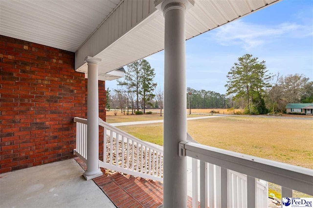 view of patio featuring a porch