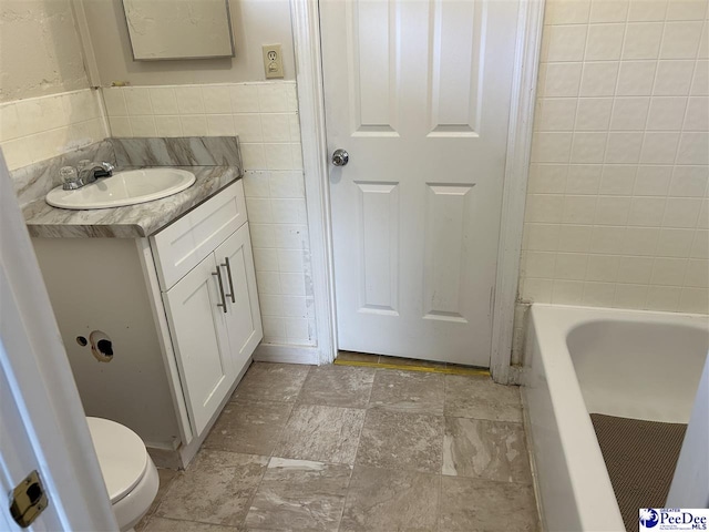 565 Davids Pond Rd, Bennettsville, SC 29512 - full bathroom with toilet, vanity, a tub, and tile walls