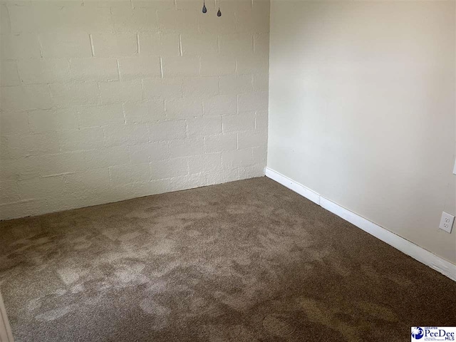 565 Davids Pond Rd, Bennettsville, SC 29512 - empty room featuring dark carpet and baseboards