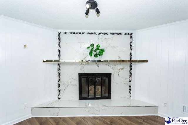 2318 Heron Dr, Florence, SC 29501 - room details with hardwood / wood-style floors, a high end fireplace, and ornamental molding