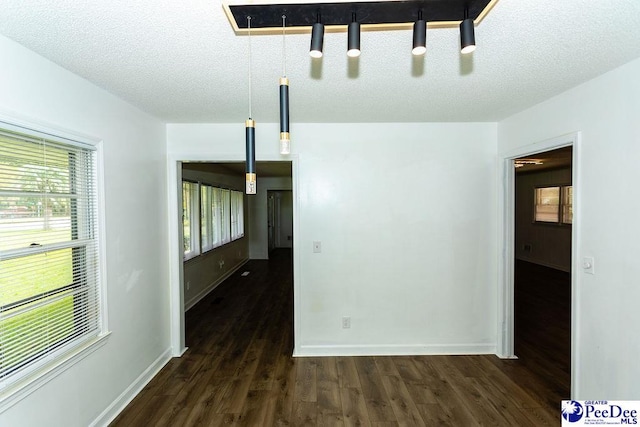 2318 Heron Dr, Florence, SC 29501 - unfurnished room featuring dark hardwood / wood-style flooring and a textured ceiling