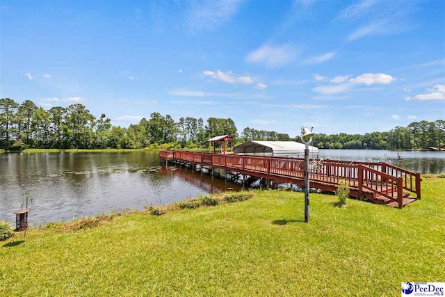 dock area featuring a yard and a water view