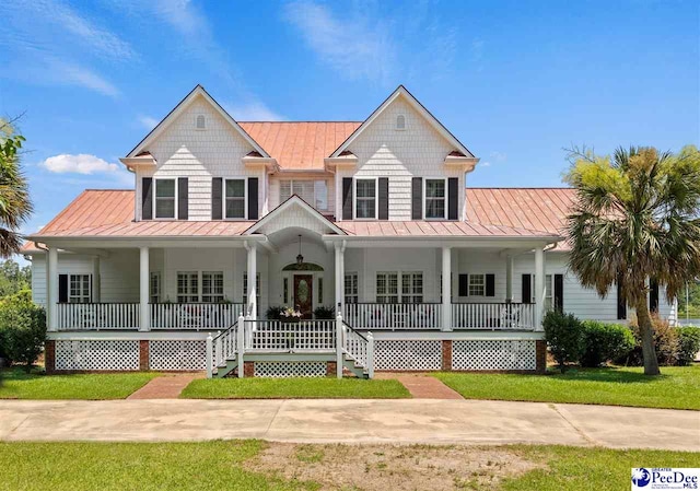 view of front of house featuring a porch and a front yard