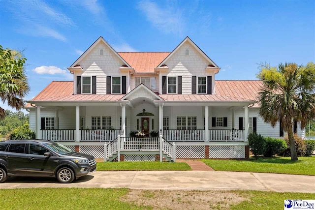 view of front facade featuring a porch and a front lawn