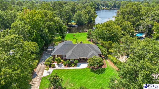 4105 Byrnes Blvd, Florence, SC 29506 - view from above of property featuring a nearby body of water and a heavily wooded area